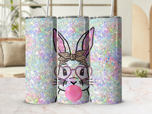Glittering Easter bunny tumbler with pink heart glasses and bubblegum.