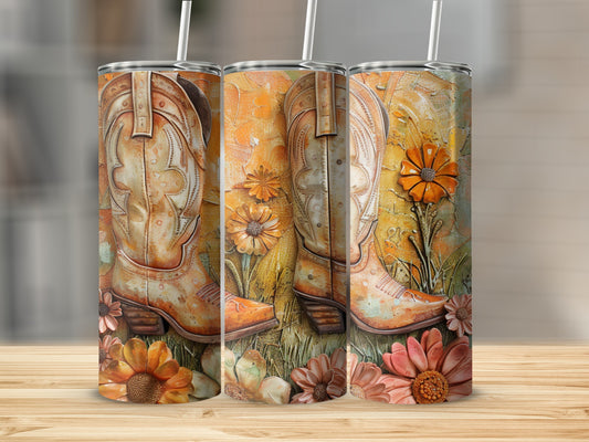 Cowboy boots and wildflowers on an orange textured tumbler.
