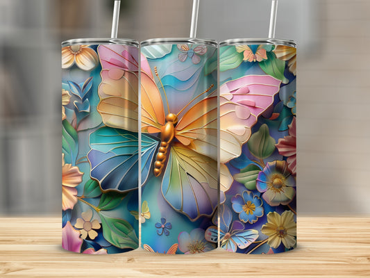 Three tall tumblers with a colorful butterfly and floral design.