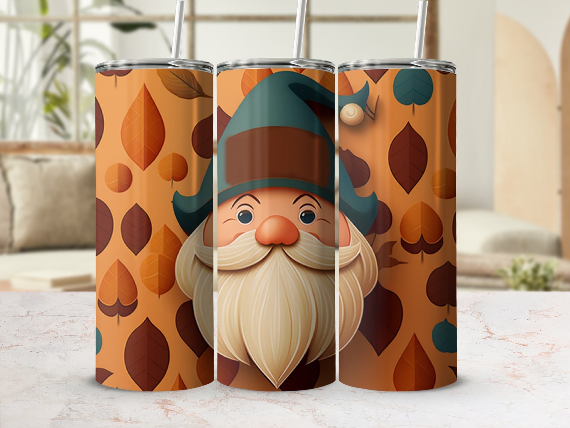 Three tumblers with a gnome design and autumn leaf pattern.