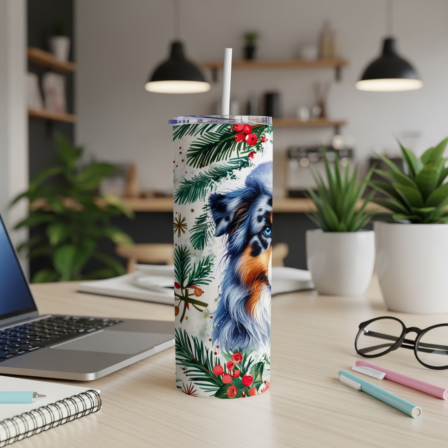 Australian Shepherd face on a Christmas tumbler with festive foliage and berries.