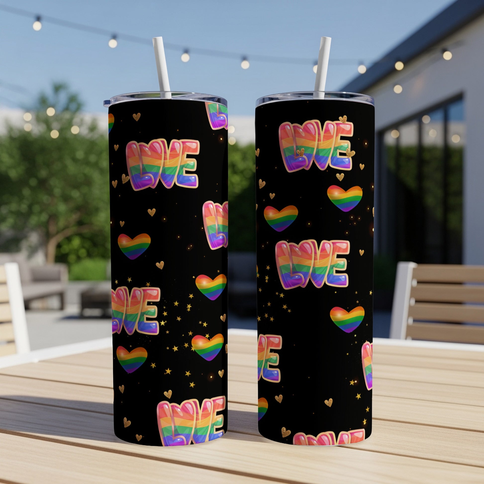 Two tumblers with "LOVE" in rainbow colors and small gold hearts on black.