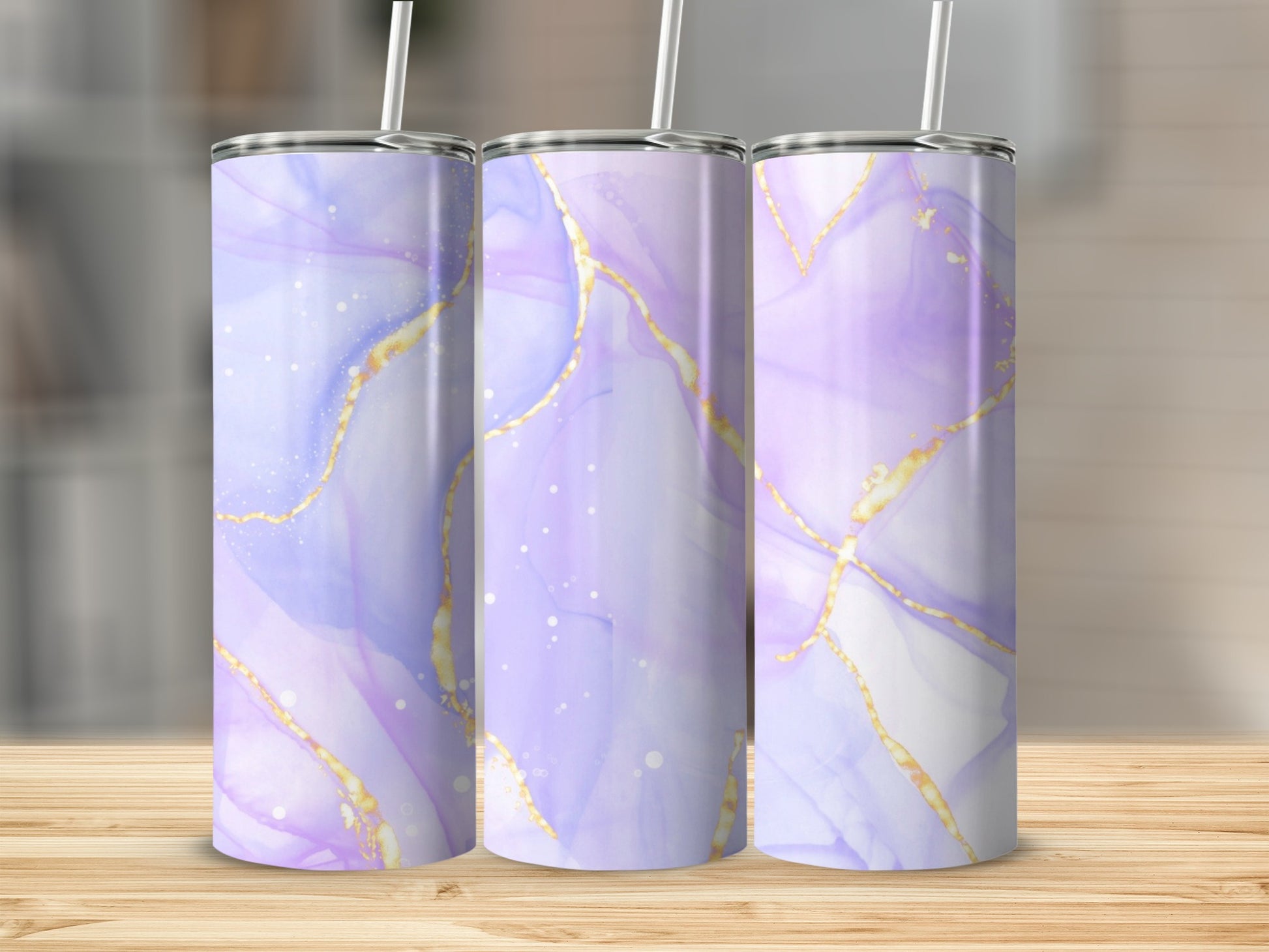 Three tumblers with marbled purple and gold abstract design.
