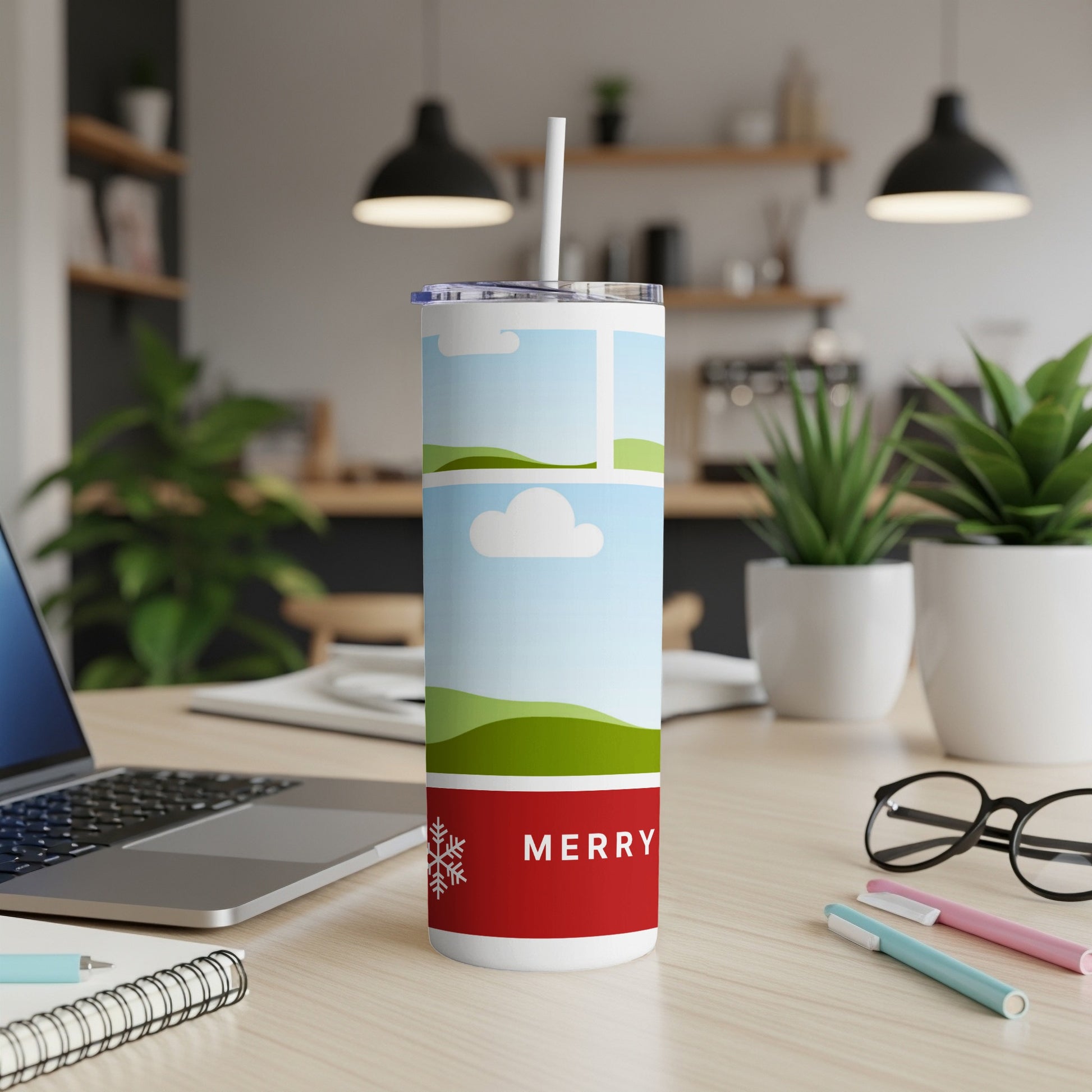 White tumbler with a straw featuring a red band and "MERRY" text with a snowflake.