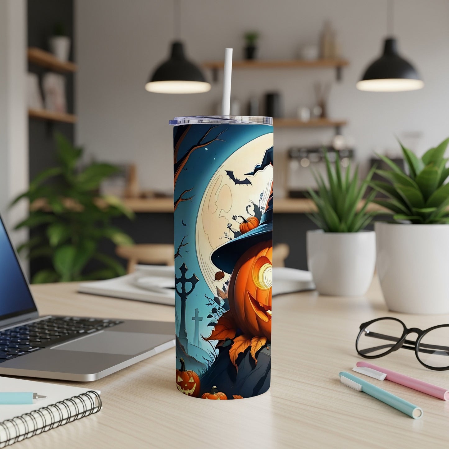 Halloween tumbler with a grinning jack-o'-lantern, bats, and full moon.