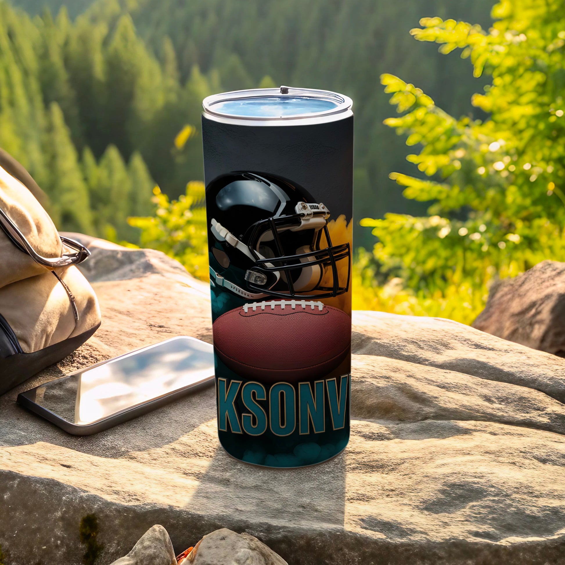 Football helmet and ball graphic on a black tumbler with "CKSONV" text.