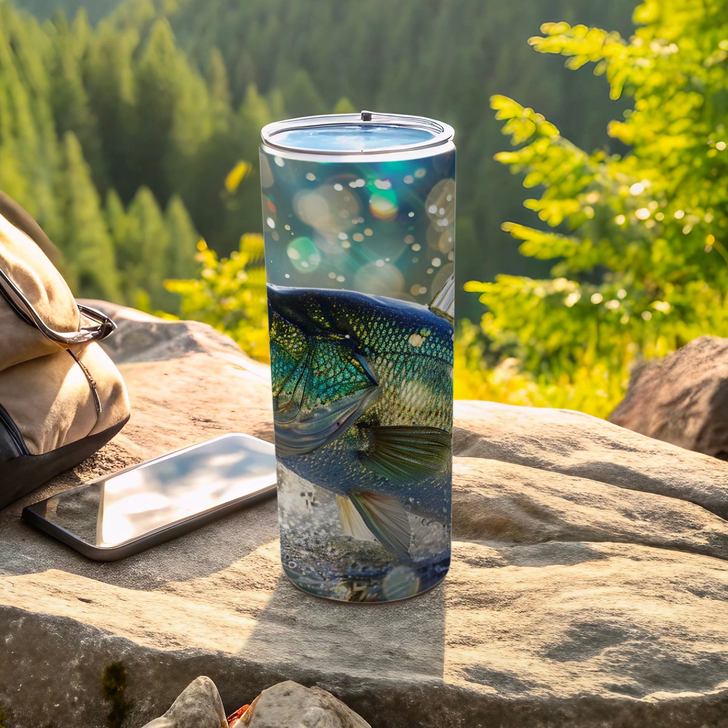 Tumbler with a close-up of a colorful fish on a rocky, outdoor surface.