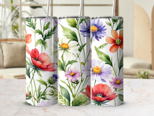 Three tumblers with watercolor floral designs featuring poppies and daisies.