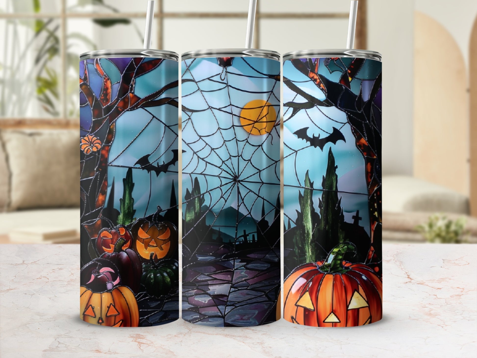Halloween tumbler with pumpkins, bats, spiderweb, and full moon.