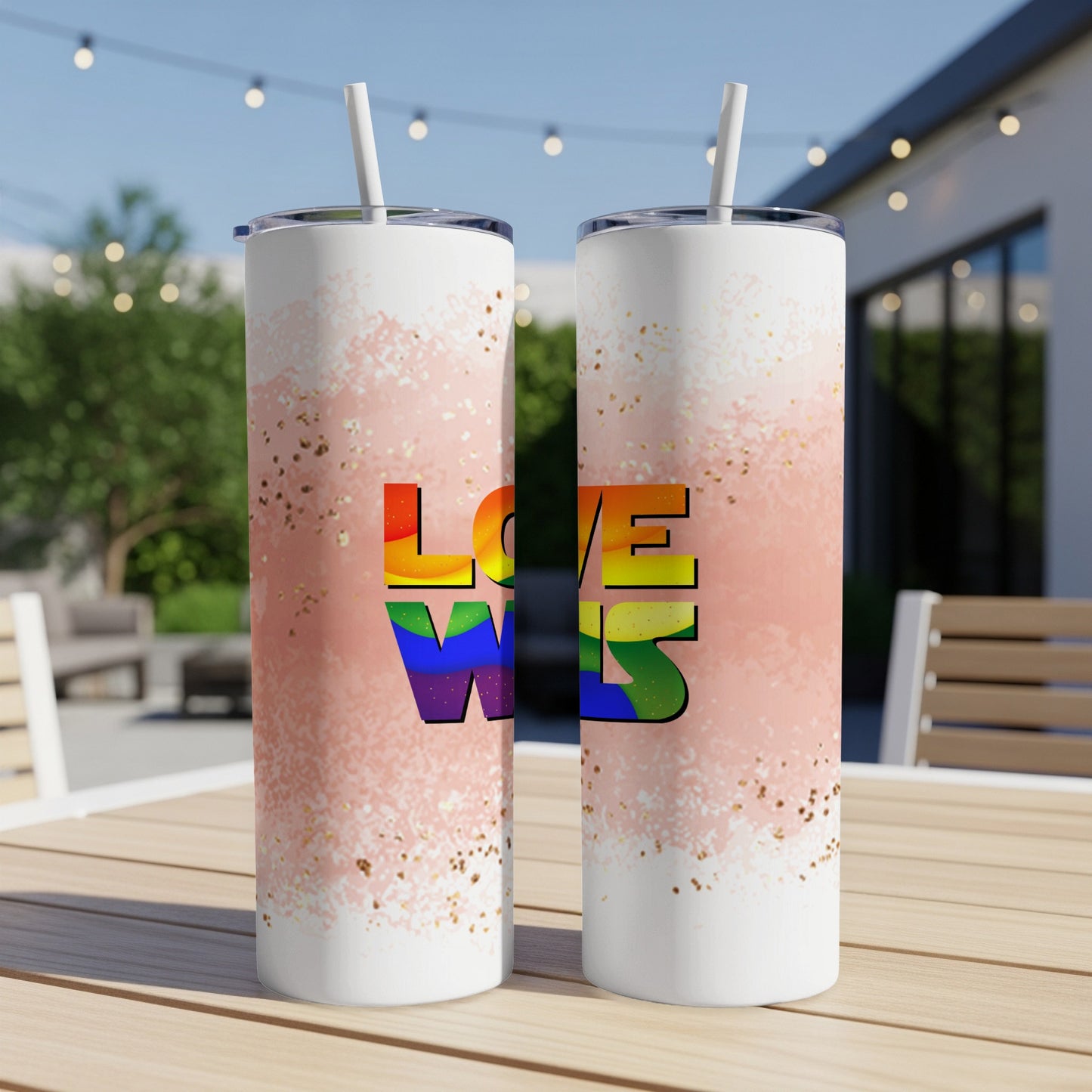 Two tall tumblers with rainbow "LOVE WINS" text and glitter design.