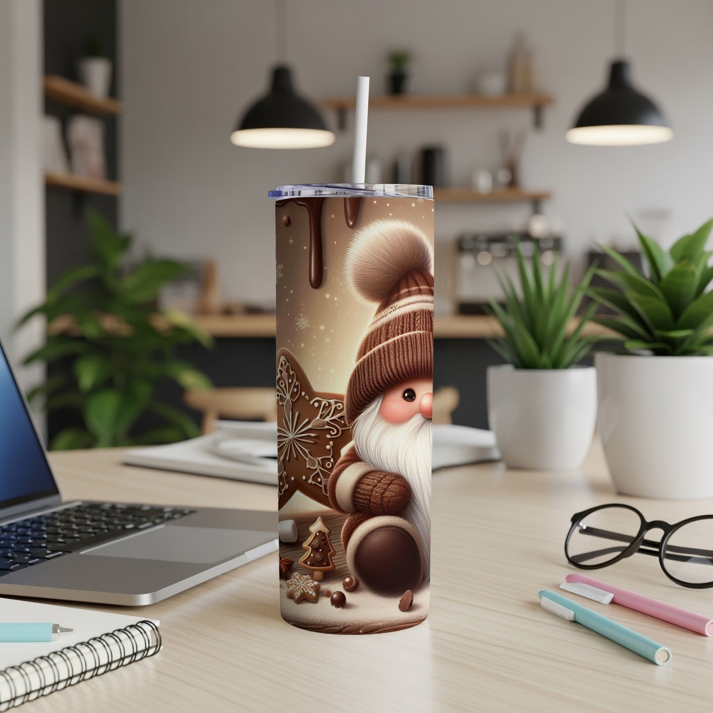 Tumbler with a gnome wearing a brown hat and scarf, holding cookies.