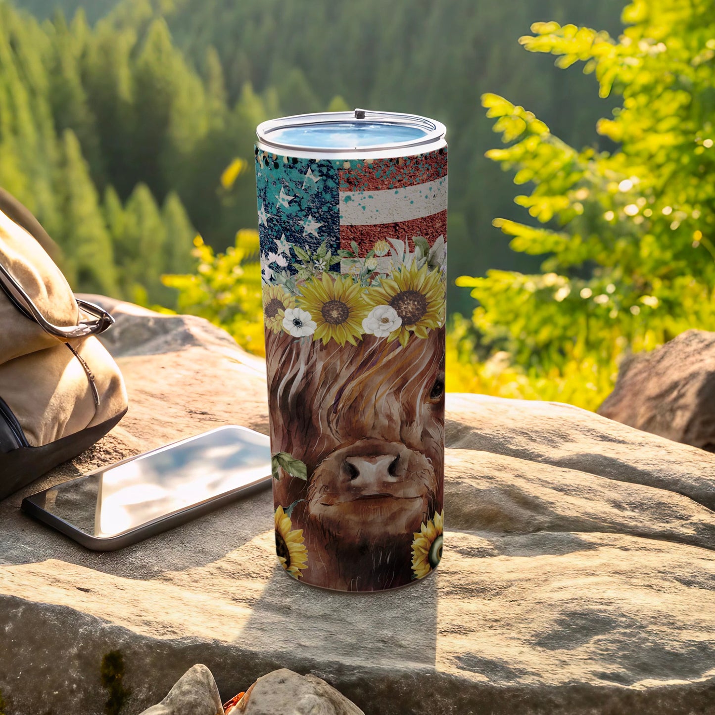 Highland cow tumbler with American flag and sunflowers.