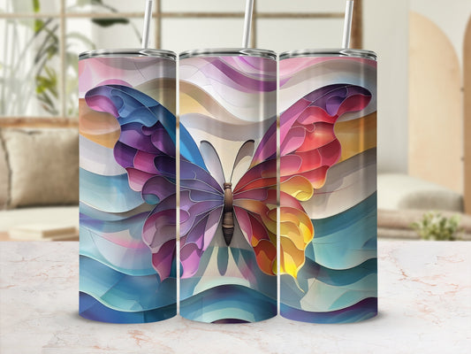 Three tumblers with colorful stained-glass butterfly designs.