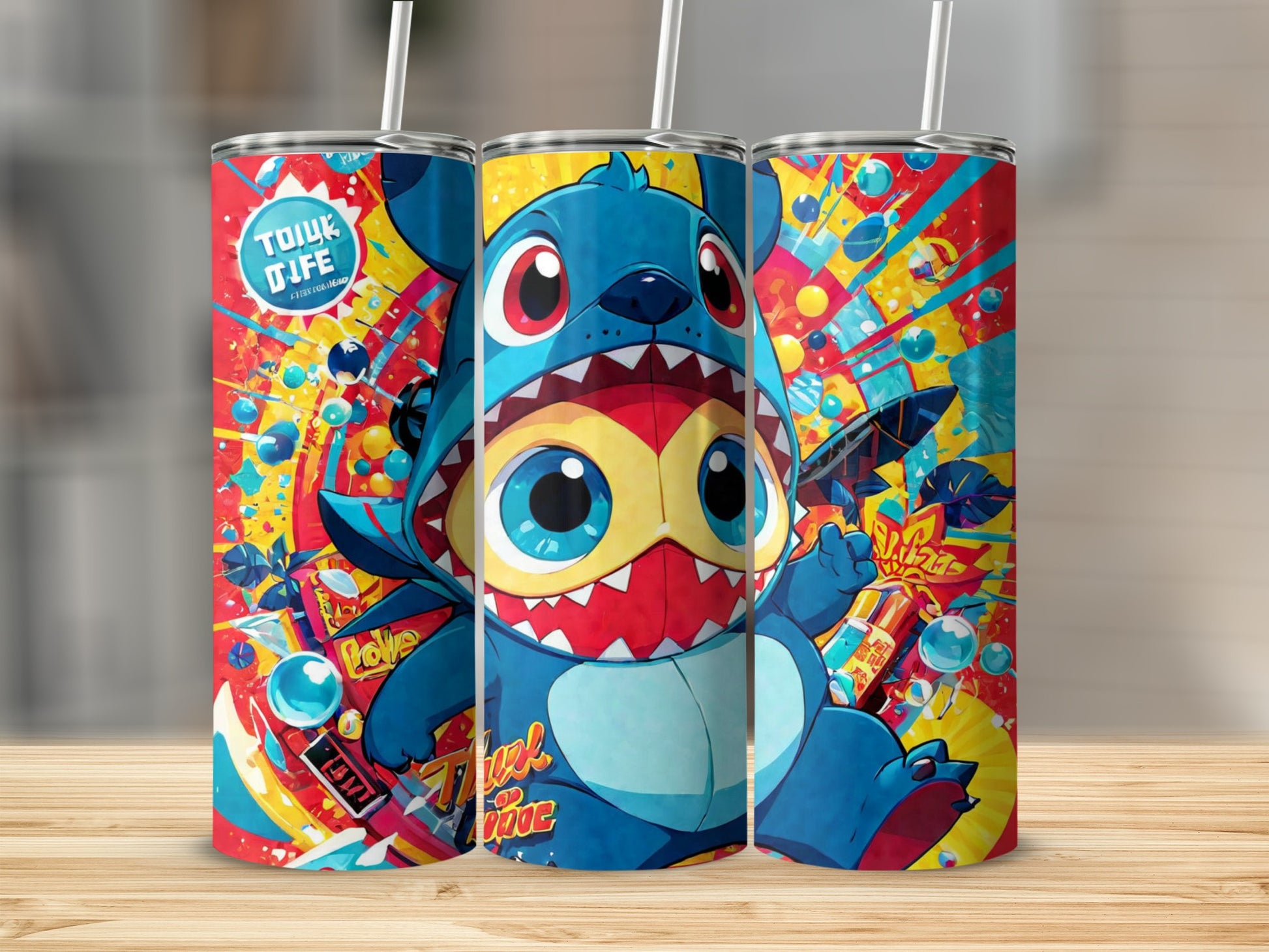 Three colorful tumblers featuring cartoon character Stitch from Lilo & Stitch.