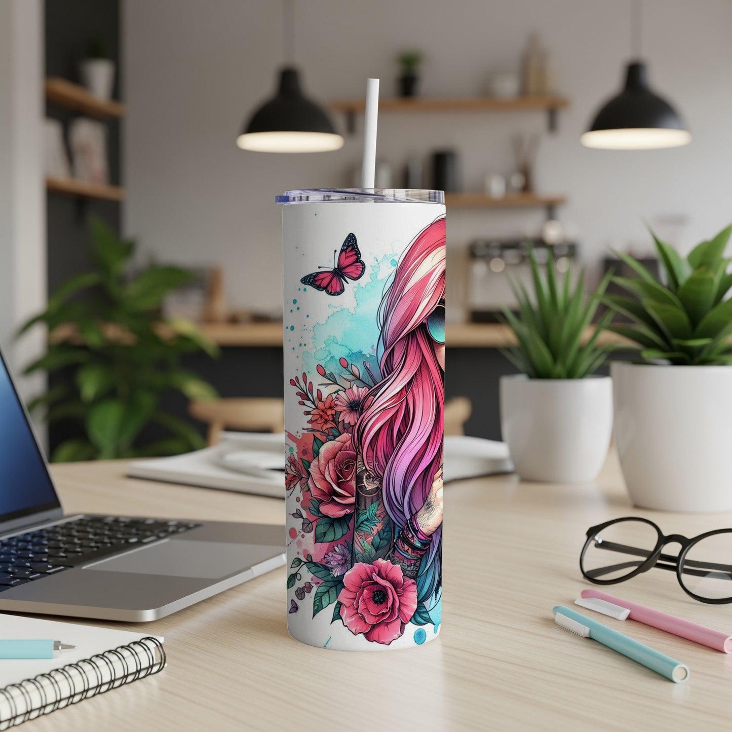 Pink-haired woman with floral accents on a white tumbler, with a butterfly.