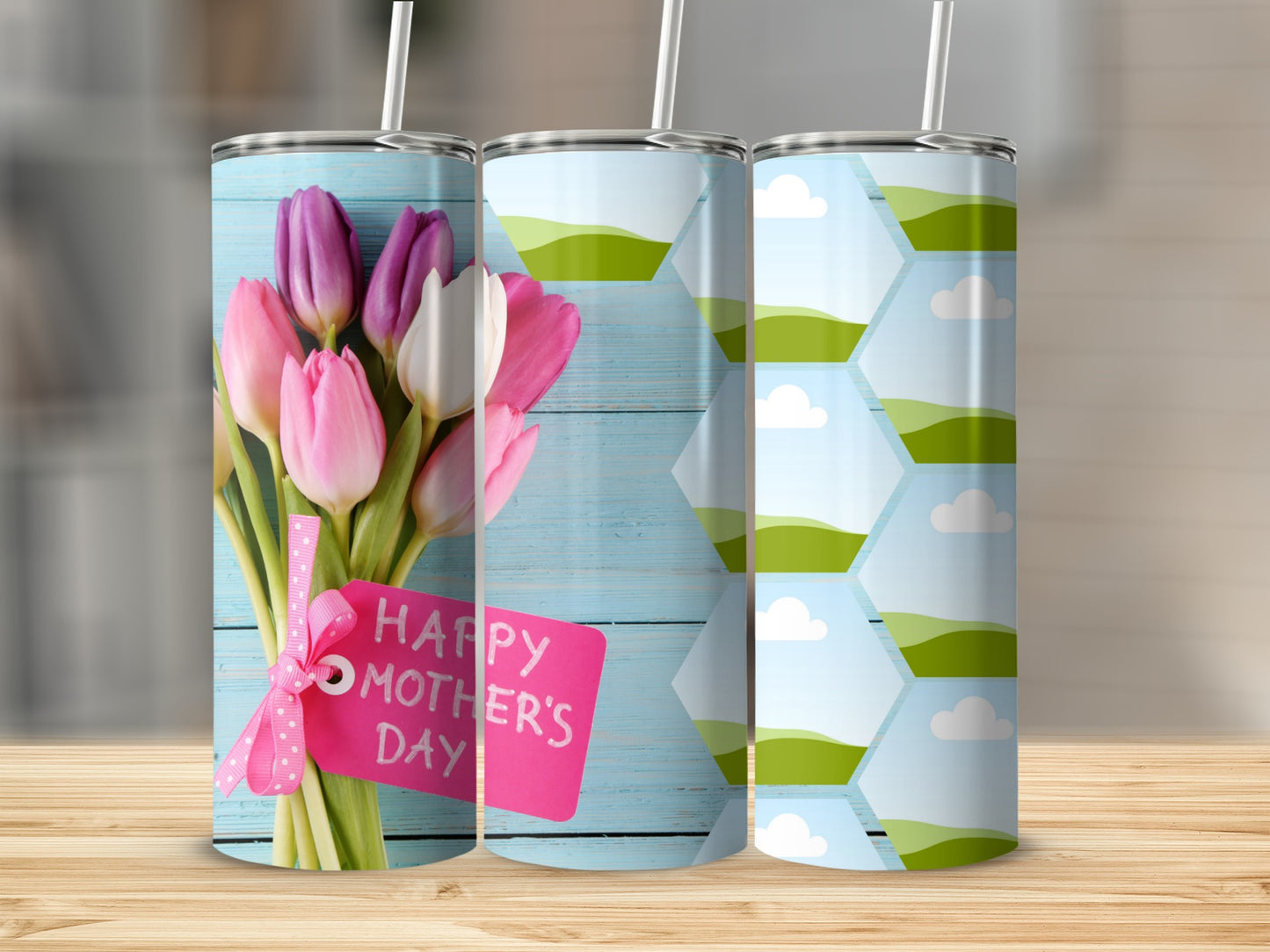 Three tumblers with Mother's Day tulips and a landscape design.