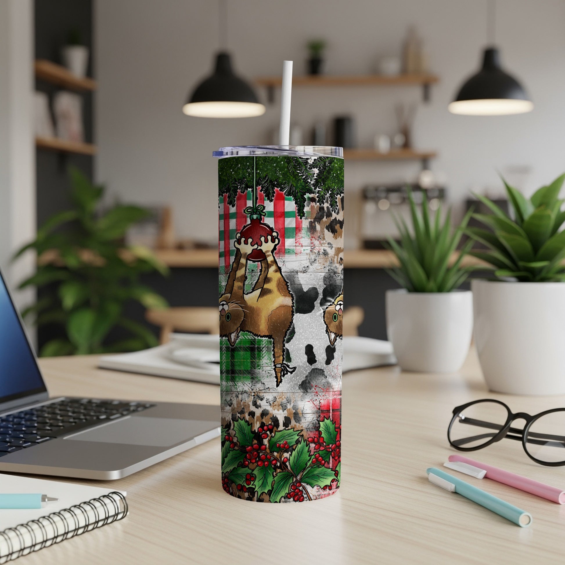 Christmas tumbler with cow and deer, plaid and holly design.
