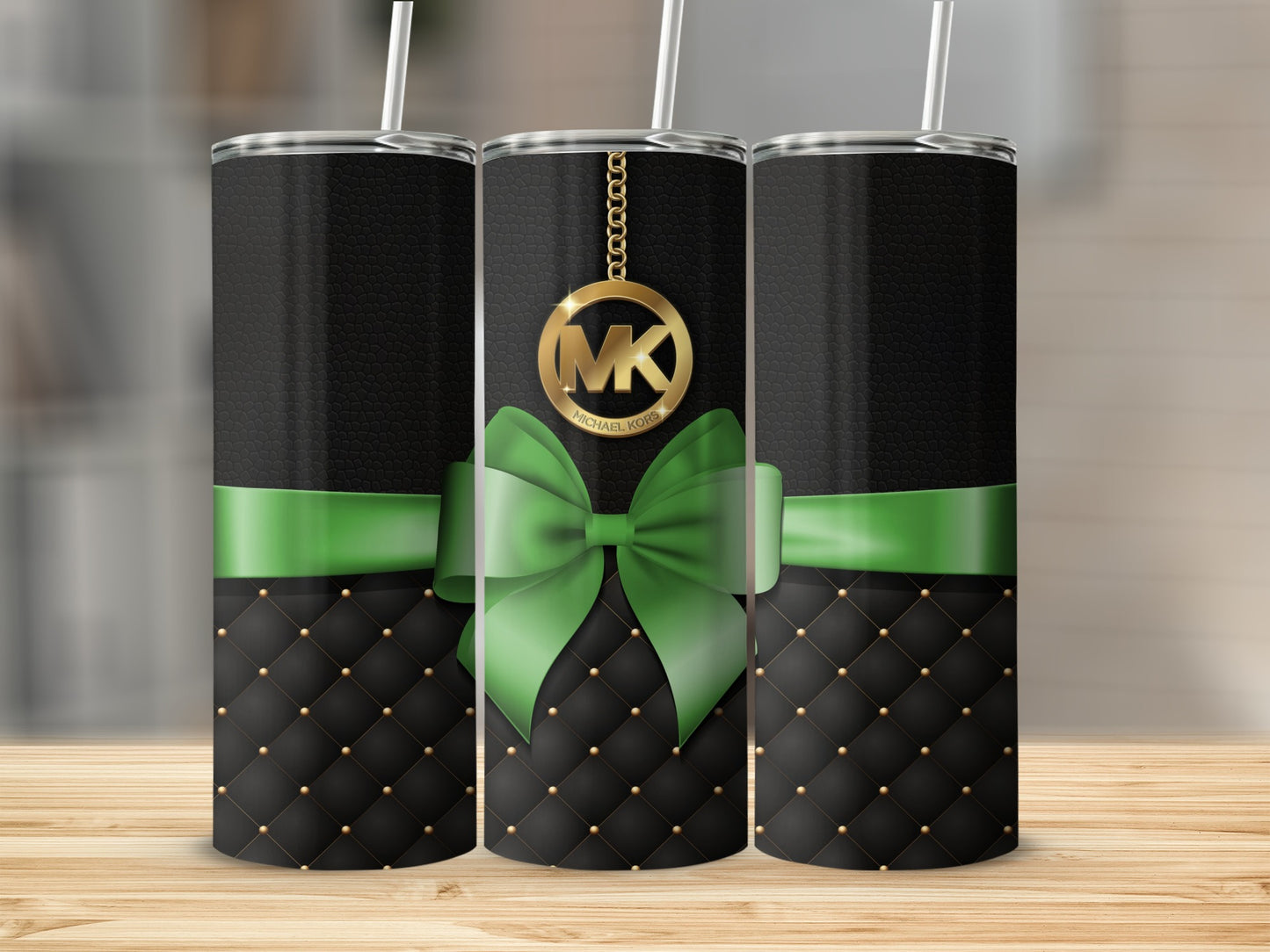 Elegant Black and Green Tumbler with Gold MK Pendant