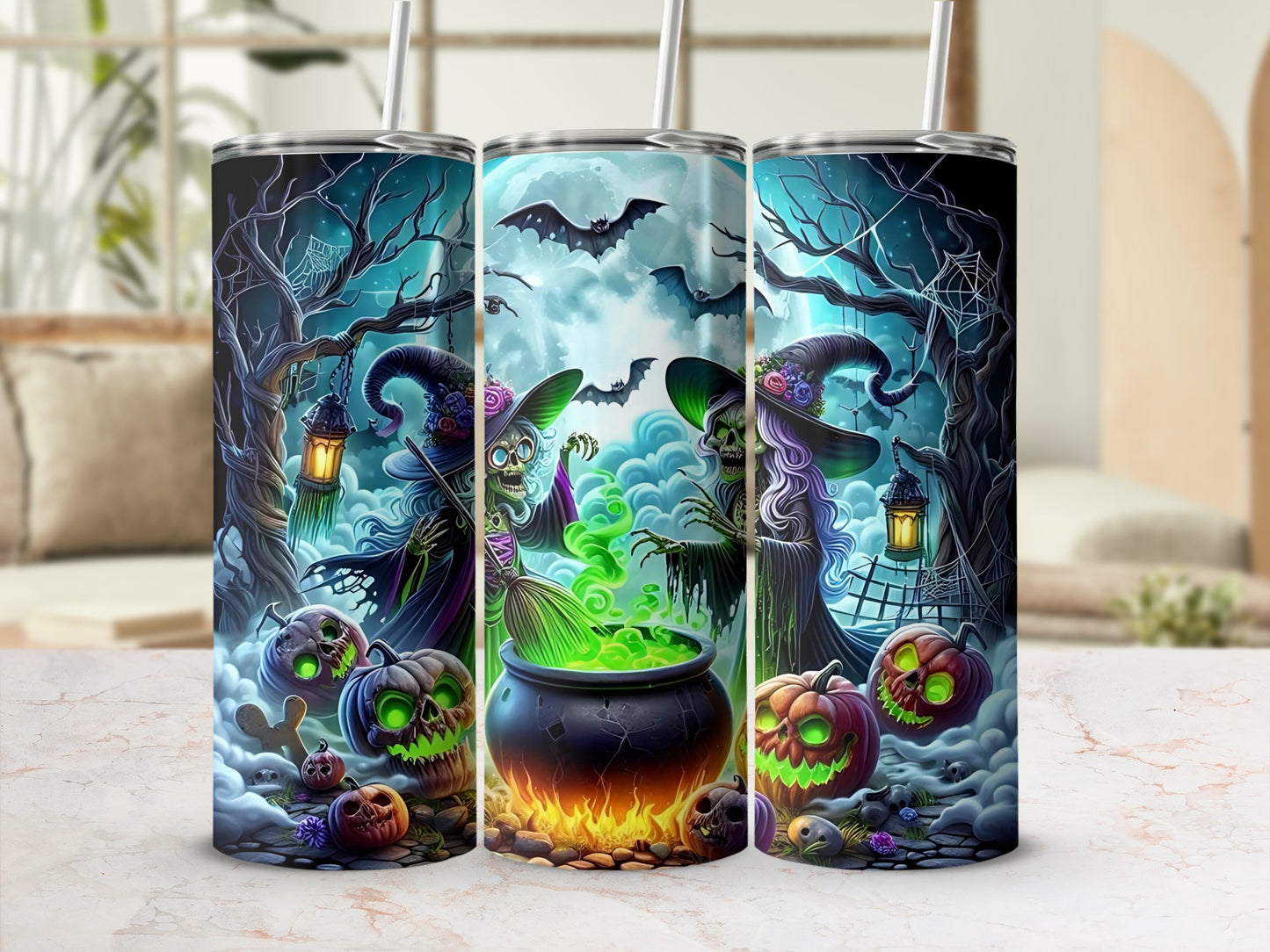Three tumblers featuring Halloween witches, cauldrons, pumpkins, and bats.
