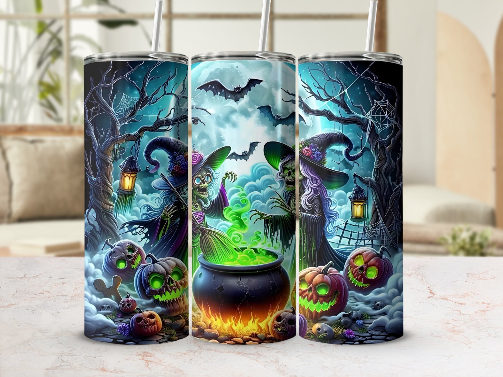 Three tumblers featuring Halloween witches, cauldrons, pumpkins, and bats.