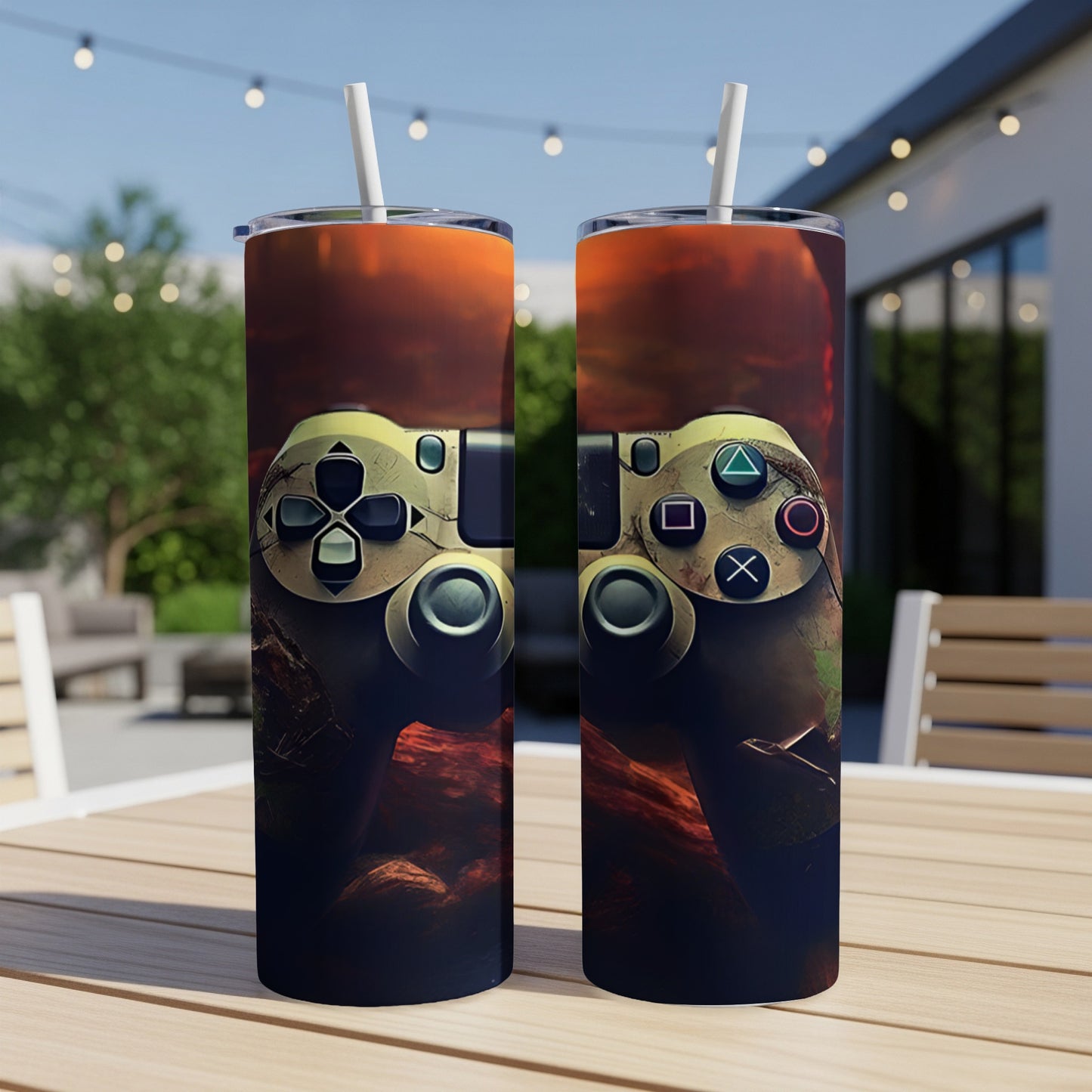 Gold video game controller with abstract background on two tumblers.