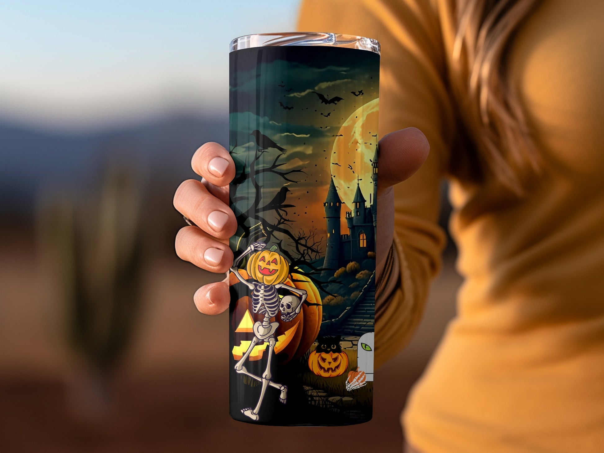 Spooky Halloween-Themed Tumbler with Skeleton and Castle