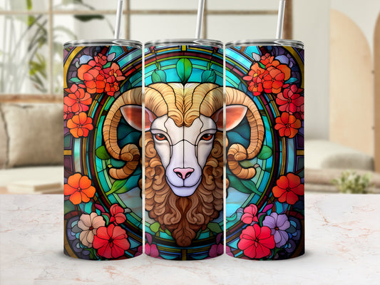 Three colorful tumblers featuring stained glass ram and floral designs.