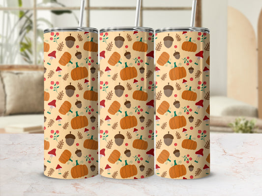Three tumblers with a fall pumpkin and mushroom pattern.