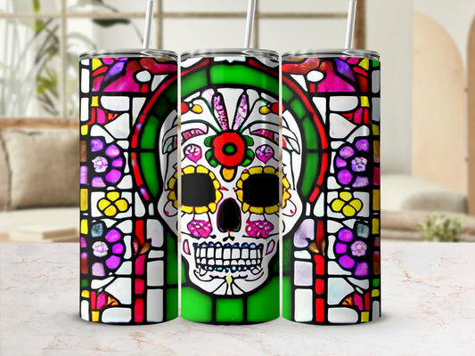 Stained glass sugar skull design on three tumblers with straws.