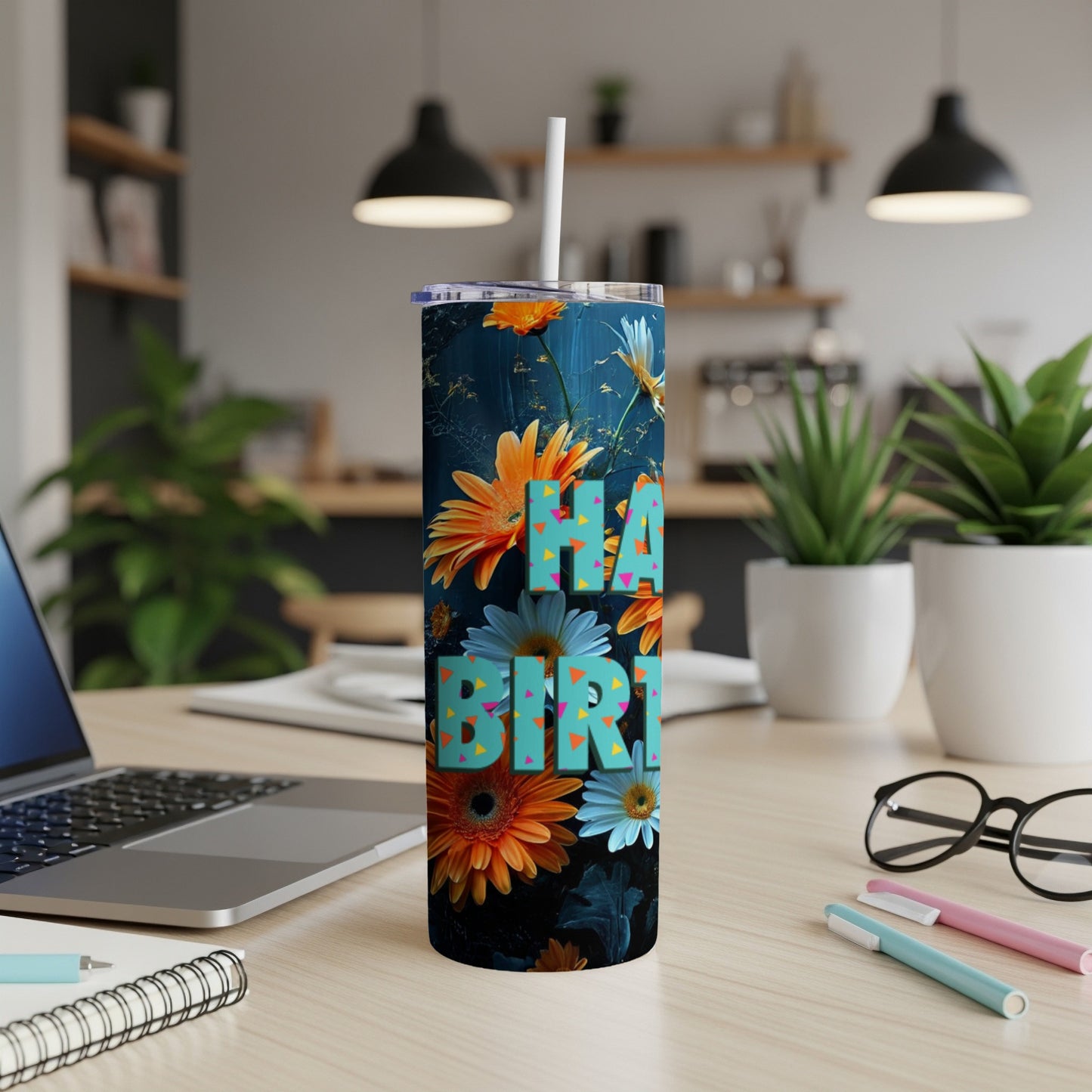 Tall tumbler with floral pattern and "Happy Birthday" text.