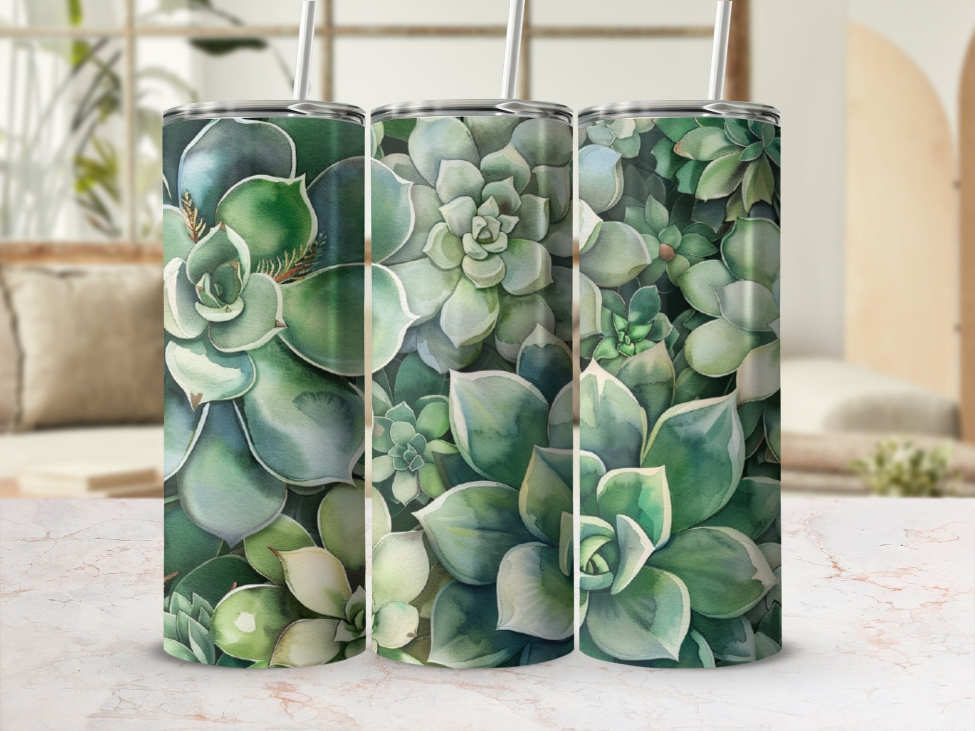 Three tumblers with a succulent plant pattern.