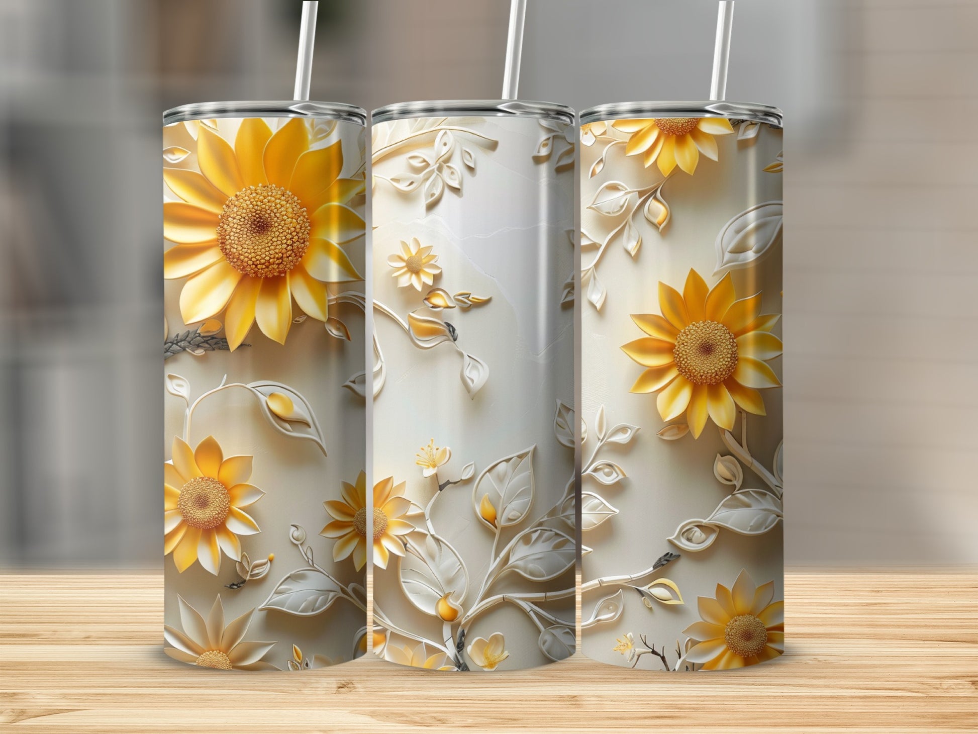 Three white tumblers with embossed sunflowers and leaves pattern.