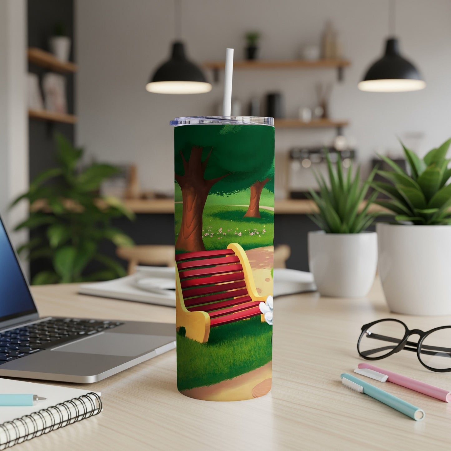 Park bench with flowers and trees, on a tumbler with a straw.