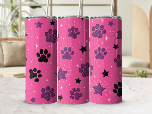 Pink tumbler with black paw prints and glitter stars pattern.