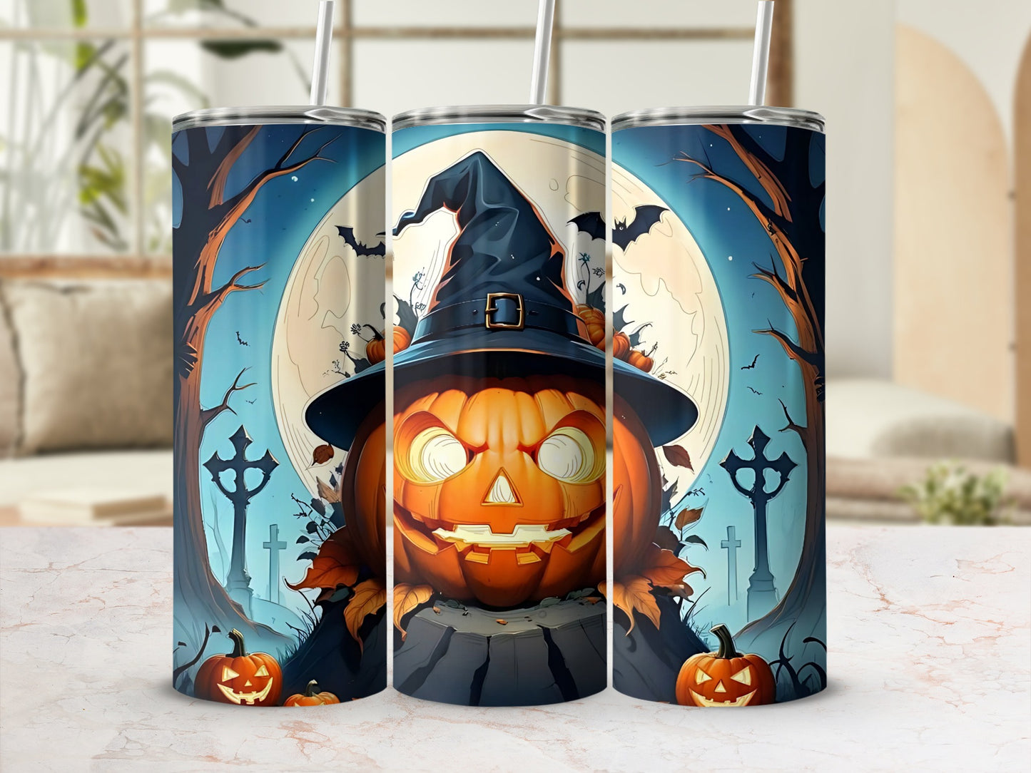 Three tumblers with a Halloween design featuring a jack-o'-lantern and bats.