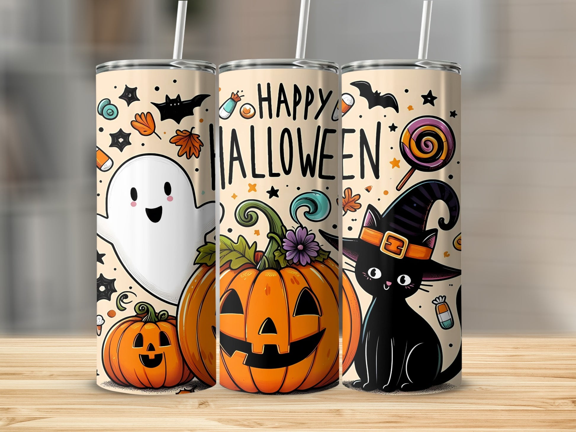 Three tumblers with "Happy Halloween" text and Halloween motifs: ghost, pumpkins, black cat.