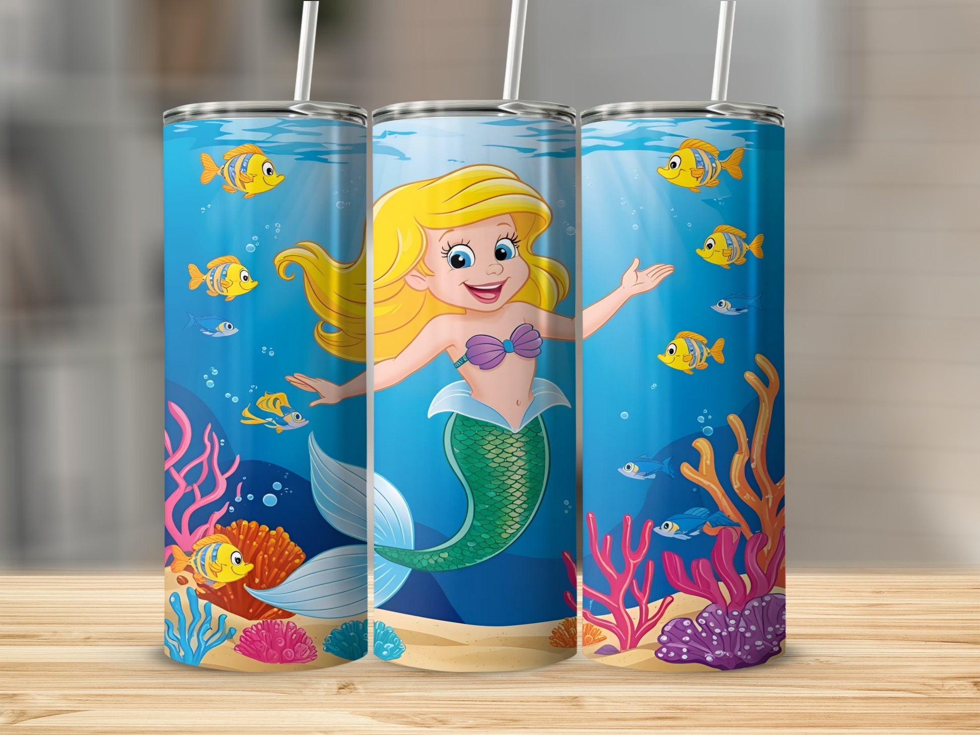 Triptych of tumblers featuring a blonde mermaid smiling in a colorful underwater scene with fish.