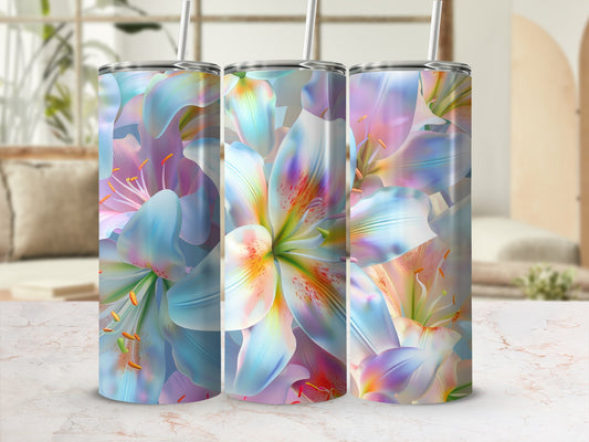 Three tumblers with a floral lily design against a blurred background.