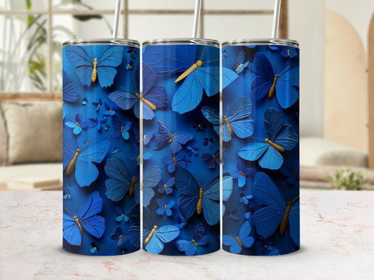 Blue butterflies pattern on three tumblers with straws.
