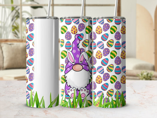 Easter gnome with colorful eggs and green grass border on a tumbler.