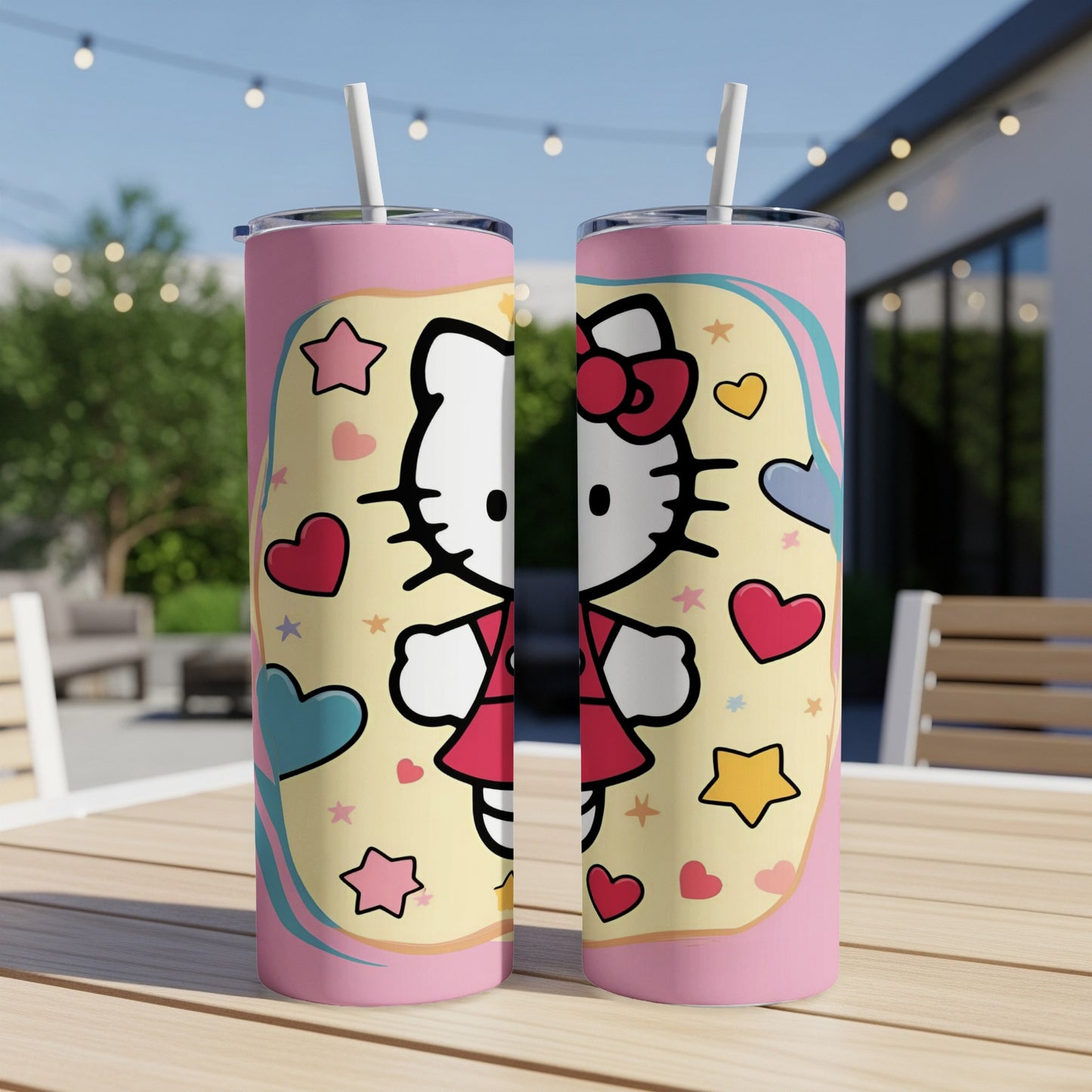 Hello Kitty tumbler with hearts and stars on a pink background.