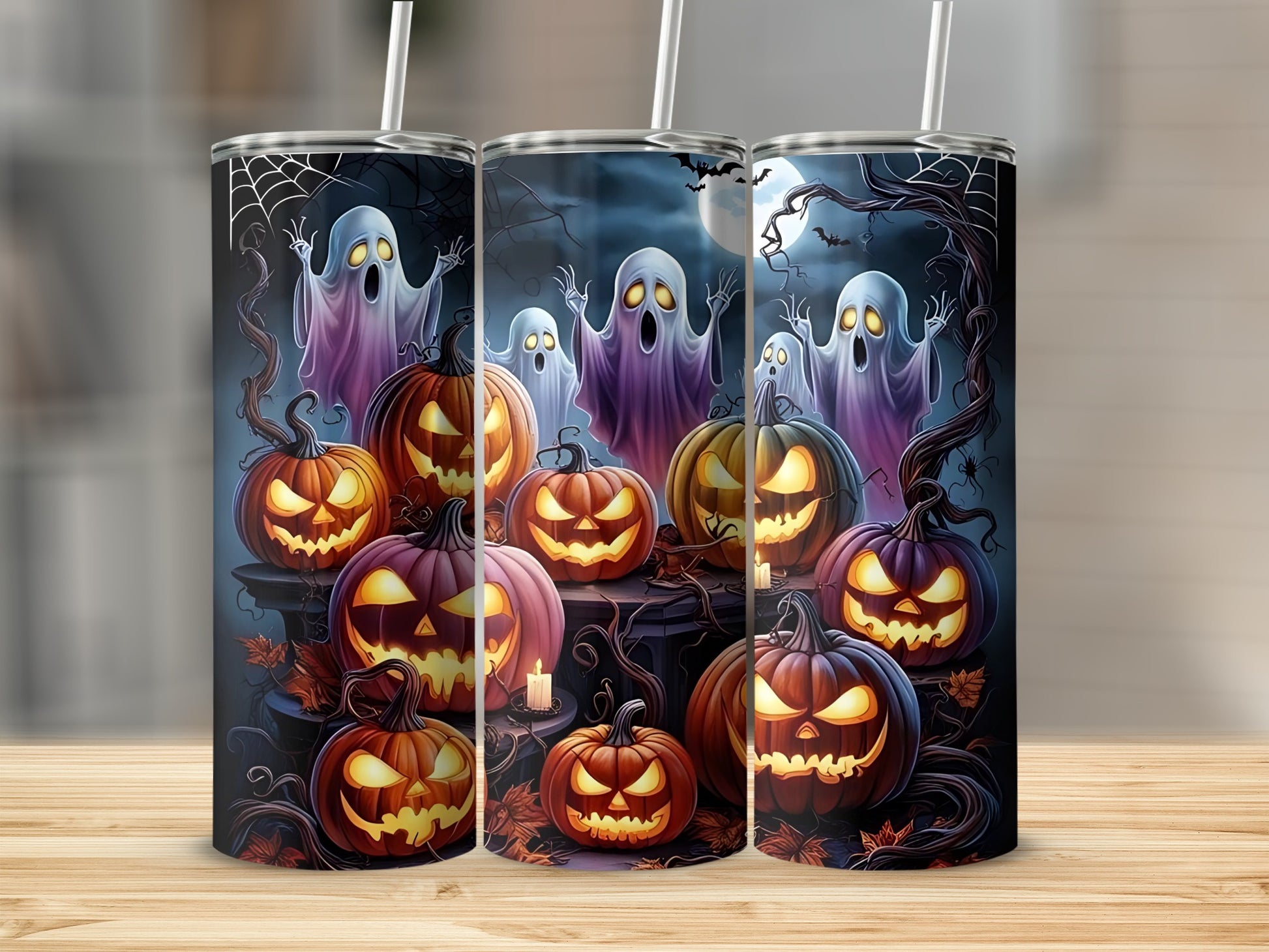Three tumblers display spooky Halloween scene with ghosts and jack-o'-lanterns.