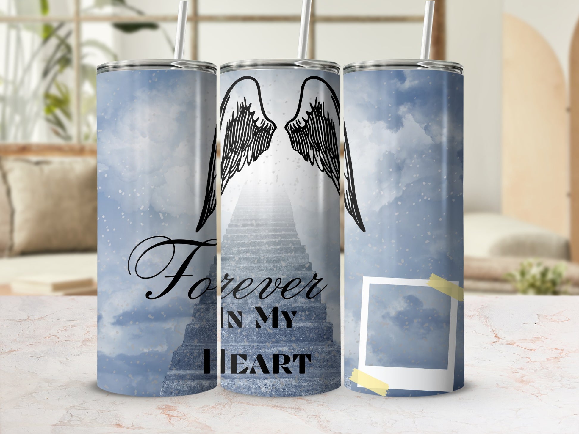 Tumbler with angel wings and stairs, reading "Forever In My Heart."