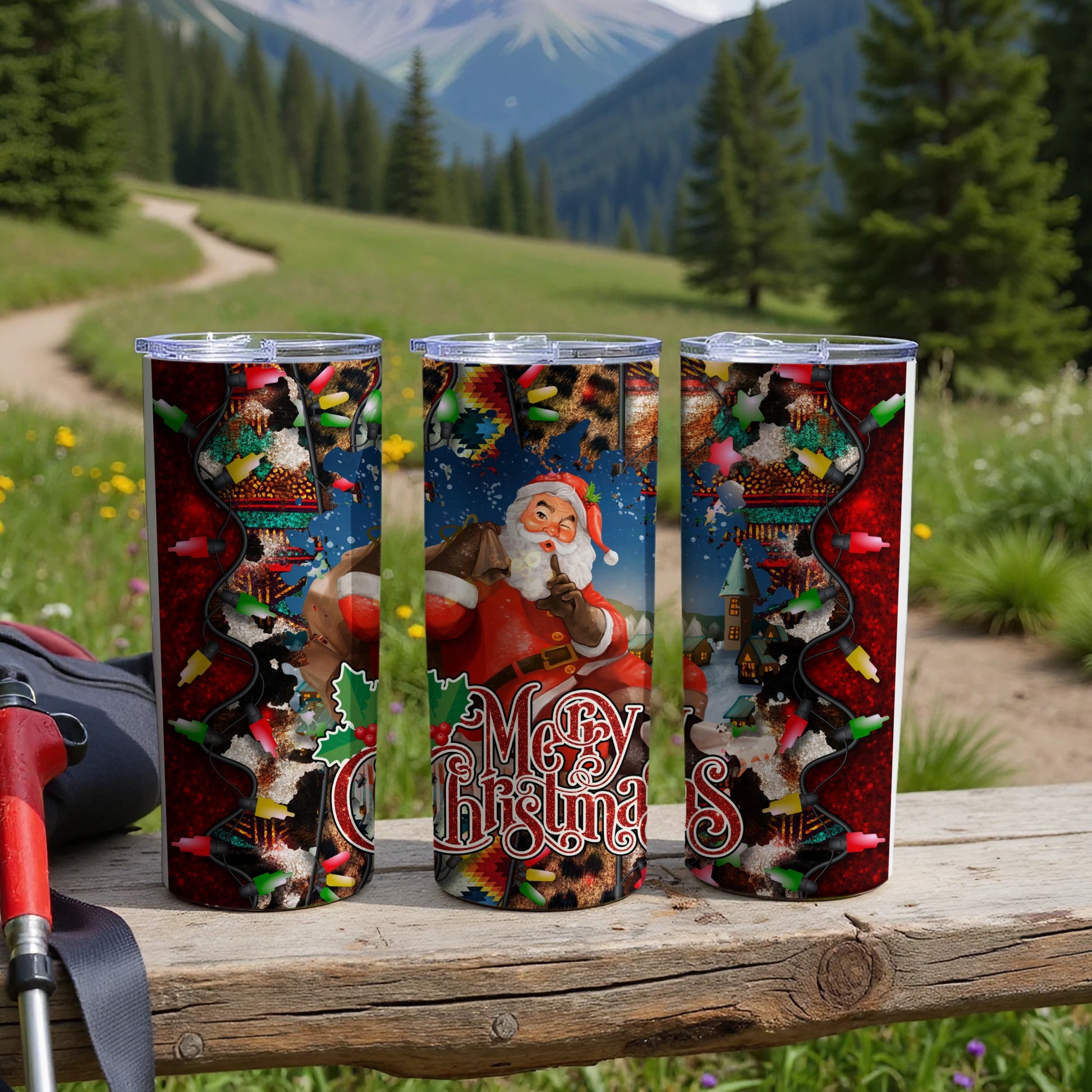 Three tumblers featuring Santa, festive lights, and a snowy village scene.