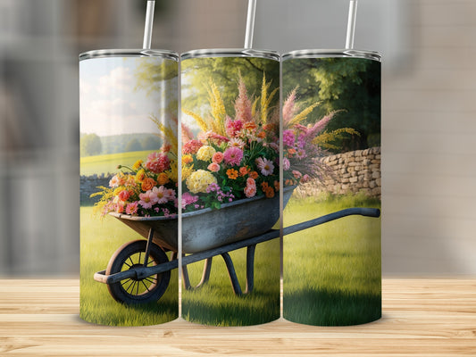 Wheelbarrow overflowing with colorful flowers in a grassy field.