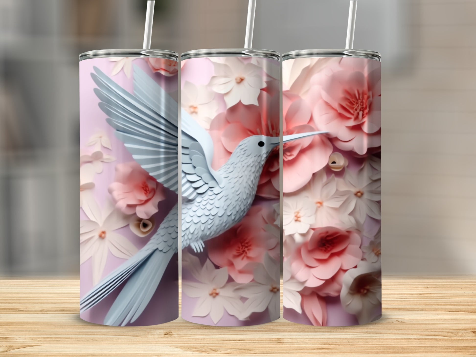 White hummingbird and pink flowers on a tumbler.
