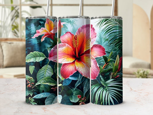 Three tumblers with vibrant hibiscus flowers and tropical leaves.