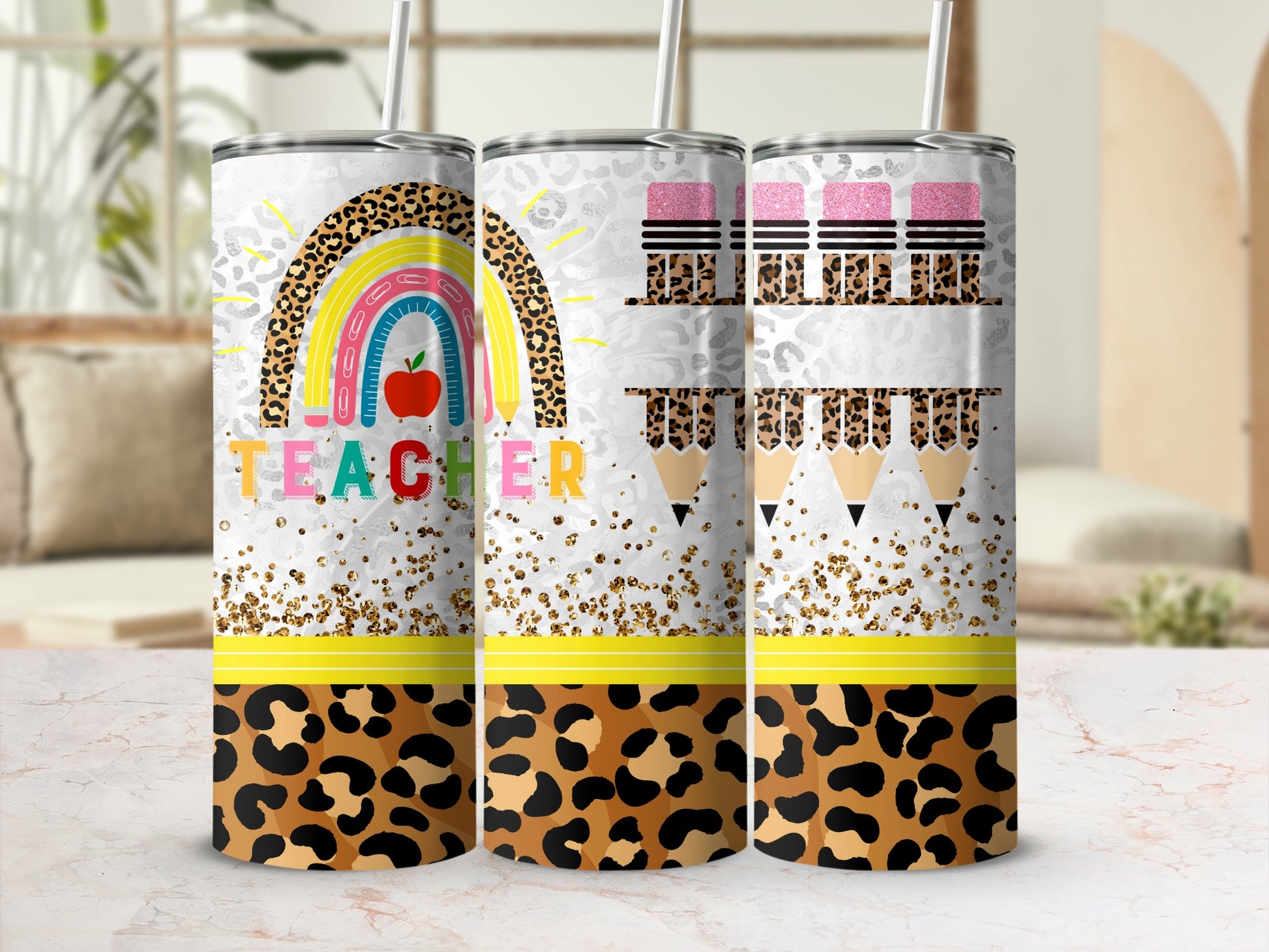 Teacher tumbler with rainbow, pencils, leopard print, and glitter accents.