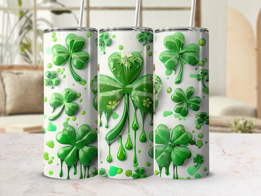 Three tumblers with dripping shamrock designs.