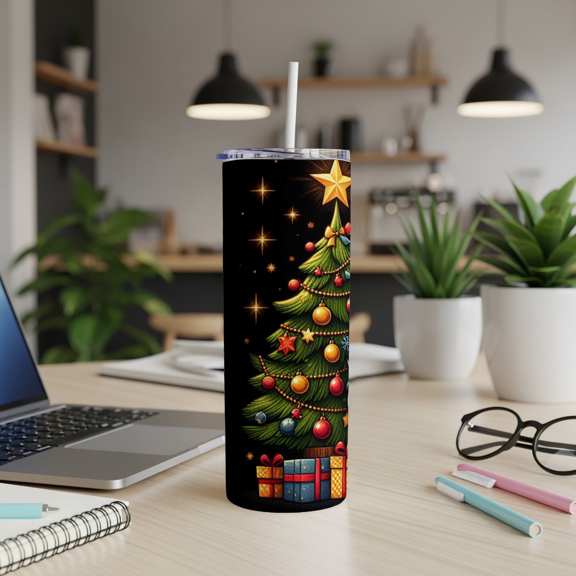 Christmas tree tumbler with ornaments, gifts, and star.